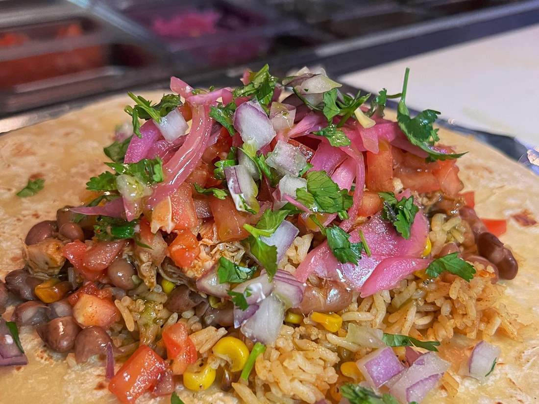 Burrito toppings before they get wrapped in a tortilla.